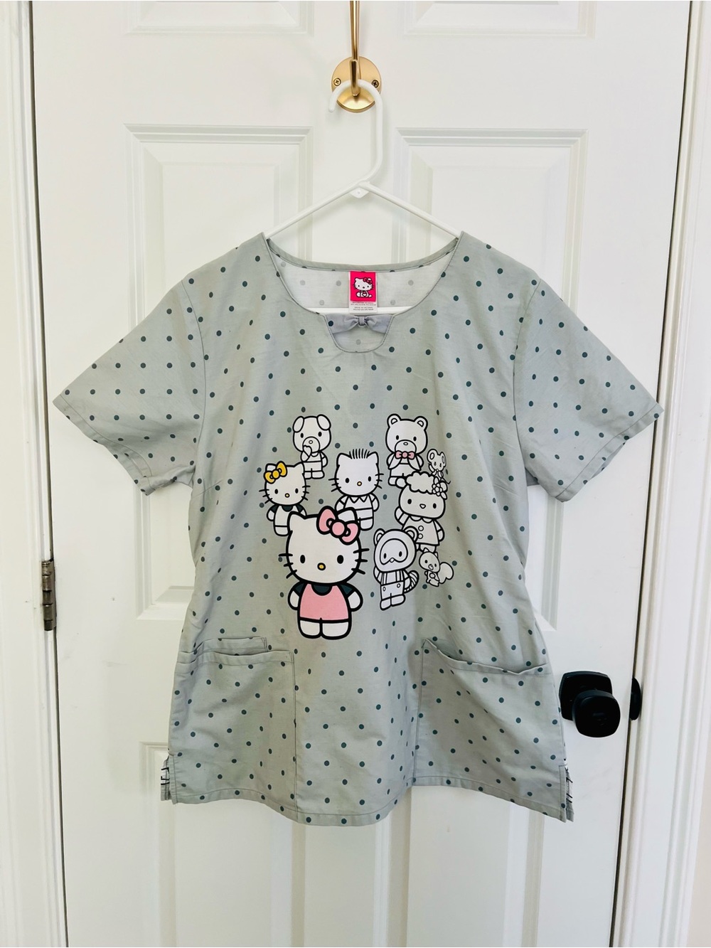 Hello Kitty Light Gray Polka Dot Kids Short Sleeve Top with Pink Accent